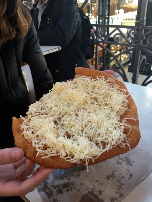 but I did buy one of these local delicacies- a langos- deep-fried dough with cheese and sour cream